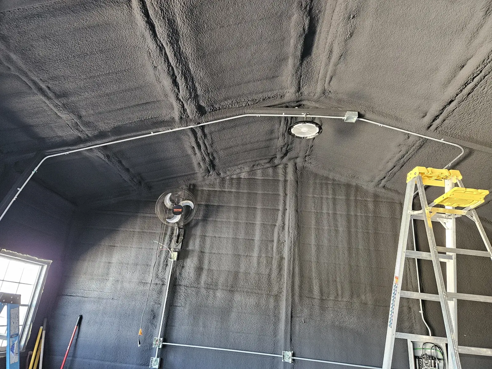Steel conduit and high-bay LED in metal building